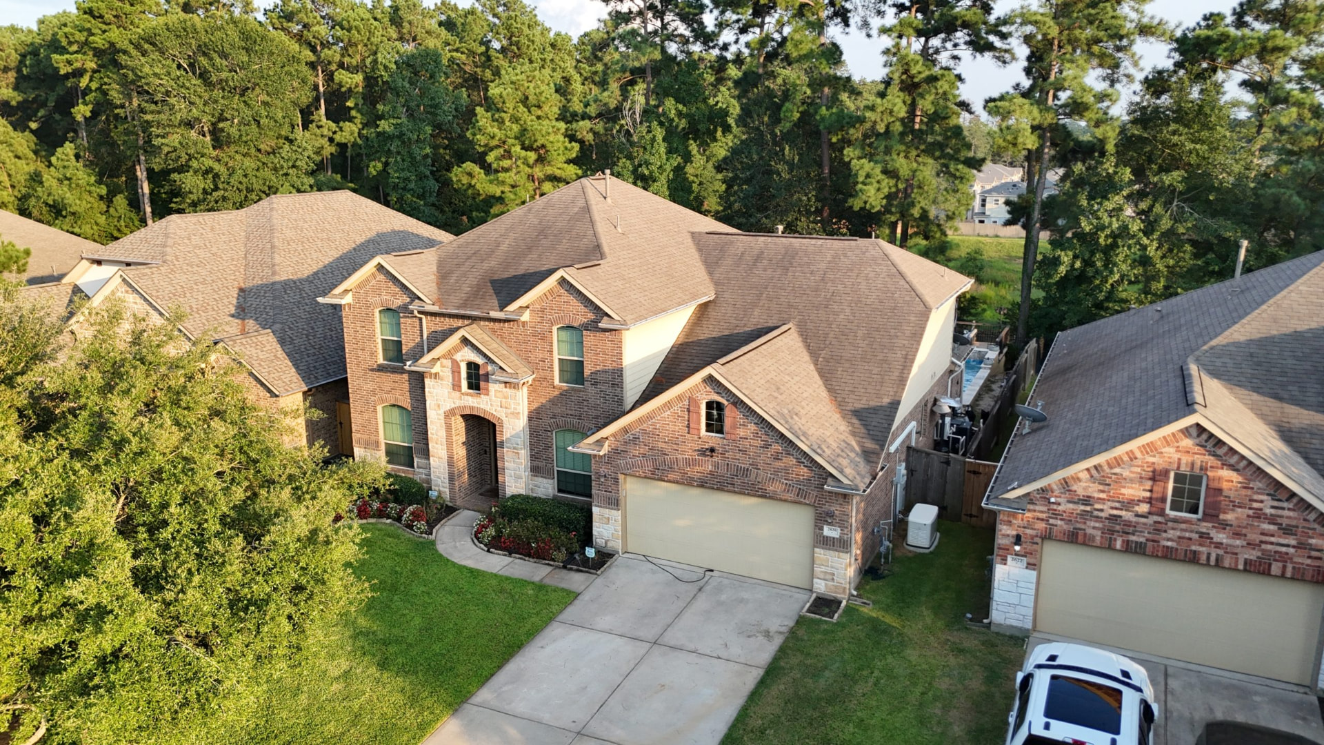North Houston home in daylight with no visible lighting hardware